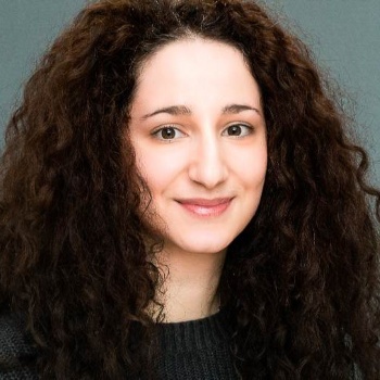 A women smiling.