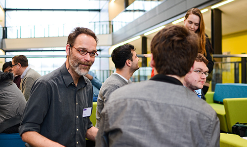 Professor in discussion with student in Alan Turing Building