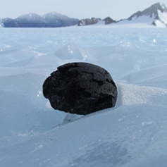 A meteorite resting on the ice in Antarctica
