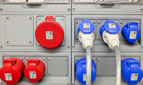 Blue and red electronic connectors, some of which are in use